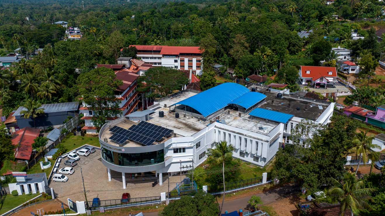 Students studying together in the serene campus of CSI College for Legal Studies
